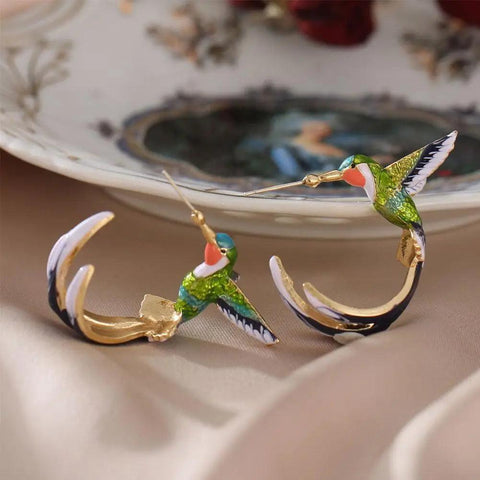 Flying Hummingbird EarringsSPECIFICATIONS

 

 

Material: Metal

Metals Type: Zinc alloy

Model Number: BT*4034

Item Type: Earrings

Style: Cute/Romantic

Back Finding: Push-back

Earring TySouvenirs 4 youSouvenirs 4 you
