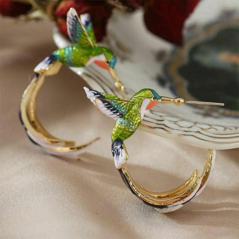 Flying Hummingbird EarringsSPECIFICATIONS

 

 

Material: Metal

Metals Type: Zinc alloy

Model Number: BT*4034

Item Type: Earrings

Style: Cute/Romantic

Back Finding: Push-back

Earring TySouvenirs 4 youSouvenirs 4 you
