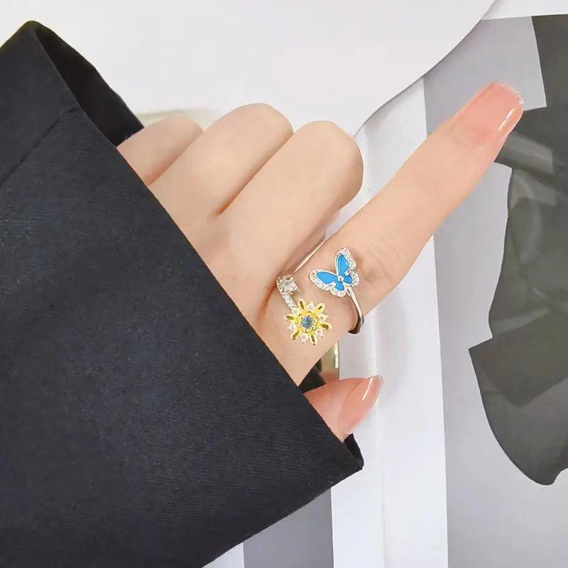 Rotating RingsSPECIFICATIONS

 

Brand Name: Hfarich

 

Metals Type: Copper

Material: CRYSTAL

Gender: Women

Compatibility: All Compatible

Item Type: Rings

Function: Mood TraSouvenir 4 youSouvenirs 4 you